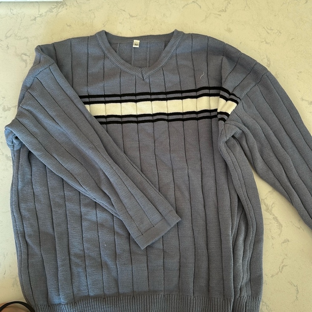 Blue sweater with stripes